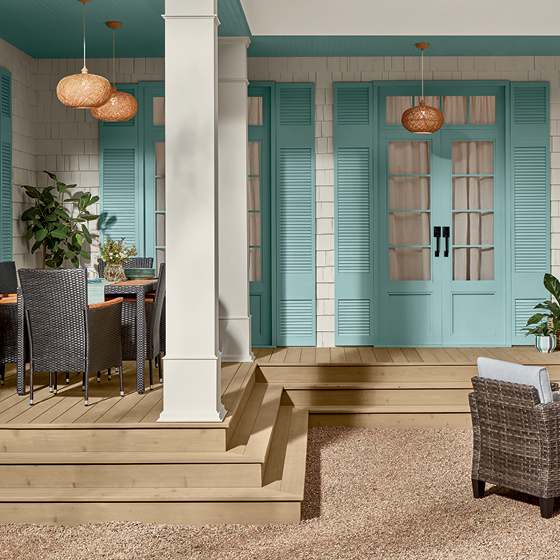 Six-image carousel of living room, child’s room, entryway, backyard and kitchen, all incorporating Renew Blue.